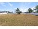 Spacious, fenced backyard with a storage shed at 21 Tracker Ct, Garner, NC 27529