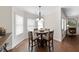 Breakfast nook is a bright space surrounded by windows for natural lighting at 21 Tracker Ct, Garner, NC 27529
