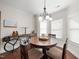 Dining room with a round table and unique decorative accents at 21 Tracker Ct, Garner, NC 27529