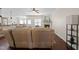 Inviting living room with a comfortable sectional sofa, fireplace, and an open layout at 21 Tracker Ct, Garner, NC 27529