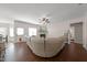 Inviting living room with a comfortable sectional sofa, fireplace, and an open layout at 21 Tracker Ct, Garner, NC 27529