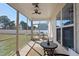 Inviting screened porch with patio furniture for outdoor living at 21 Tracker Ct, Garner, NC 27529