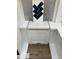 Sample of black subway tile, white countertops, white cabinets and wood floor at 239 Meadowbark Bnd # 27, Garner, NC 27529
