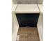 A selection of tile samples including flooring, dark cabinet, and white countertops at 239 Meadowbark Bnd # 27, Garner, NC 27529