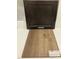 Samples of brown cabinet and wood flooring perfect for a new bathroom or kitchen at 239 Meadowbark Bnd # 27, Garner, NC 27529