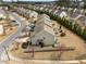 Aerial view of a community of homes with well-maintained yards and landscaping in a suburban setting at 241 Westgrove Ct, Durham, NC 27703