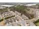 An aerial view of a residential neighborhood with lush trees and well-maintained homes at 241 Westgrove Ct, Durham, NC 27703