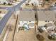 Aerial view of a fenced backyard with patio seating and manicured landscaping at 241 Westgrove Ct, Durham, NC 27703