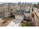 Two-story home featuring a two-car garage and neutral-colored exterior with well-maintained landscaping at 241 Westgrove Ct, Durham, NC 27703