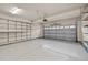 Spacious garage with overhead storage and shelving system at 241 Westgrove Ct, Durham, NC 27703