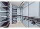 Walk-in closet featuring an organizer with shelves, and built-in drawers and racks at 241 Westgrove Ct, Durham, NC 27703