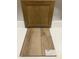 Close-up of Shaw luxury vinyl flooring samples with cabinet door options at 243 Meadowbark Bnd # 28, Garner, NC 27529