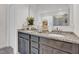 Bathroom vanity with double sinks, granite countertop, and dark wood cabinets at 2741 Rains Dr, Haw River, NC 27258