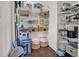 Organized pantry with shelving and storage solutions for kitchen supplies and household items at 2741 Rains Dr, Haw River, NC 27258