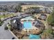 Wide aerial shot of the community pool, clubhouse, and other amenities available at 2821 Casona Way, Raleigh, NC 27616