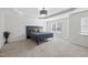 Spacious bedroom featuring a tray ceiling and a plush bed with stylish bedding at 2821 Casona Way, Raleigh, NC 27616