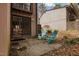 Patio with view of backyard and two Adirondack chairs at 3080 Colony Rd # A, Durham, NC 27705