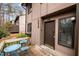 Charming townhome entrance with a welcoming front porch and manicured flower box at 3080 Colony Rd # A, Durham, NC 27705