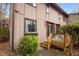 Inviting townhome featuring a charming front porch and well-maintained landscaping at 3080 Colony Rd # A, Durham, NC 27705