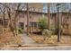 View of the exterior featuring mature trees and landscaping around the property at 3080 Colony Rd # A, Durham, NC 27705