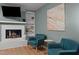 Close-up of the living room fireplace and seating area at 3080 Colony Rd # A, Durham, NC 27705