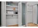 White storage closet with shelves, perfect for organizing linens and household items at 3080 Colony Rd # A, Durham, NC 27705