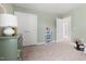 Neutral bedroom with closet and sage green walls at 3103 Woodland Park Rd, Durham, NC 27703