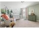 Cozy Bedroom with mountain mural, crib, and rocking chair at 3103 Woodland Park Rd, Durham, NC 27703