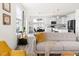 Bright and modern living room features a comfortable sofa, stylish decor, and an open floor plan at 3103 Woodland Park Rd, Durham, NC 27703