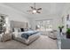 Serene main bedroom with tray ceiling, sitting area, plush carpet, and natural light at 315 Barthel Dr, Cary, NC 27513