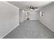 Spacious bedroom featuring neutral walls and carpet, ceiling fan, and a window providing natural light at 317 Gary St, Raleigh, NC 27606