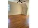 Bedroom featuring beautiful hardwood flooring and natural light at 333 Leasburg Rd, Roxboro, NC 27573