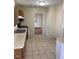 Neutral kitchen with a window and tile flooring at 333 Leasburg Rd, Roxboro, NC 27573