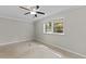 Bedroom with a window that provides natural light, and neutral walls at 3605 Octavia St, Raleigh, NC 27606