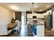 Modern kitchen with stainless steel appliances, granite counters, and a dining area at 372 White Oak Ridge Dr, Garner, NC 27529