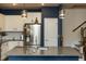 Close up on kitchen island featuring granite countertop and stainless-steel appliances at 372 White Oak Ridge Dr, Garner, NC 27529