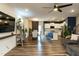 Spacious open-concept living space with wood floors flowing into dining and kitchen at 372 White Oak Ridge Dr, Garner, NC 27529
