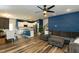 Open-concept living area with modern decor, wood floors, and ample natural light at 372 White Oak Ridge Dr, Garner, NC 27529
