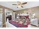 Bedroom with natural lighting, ceiling fan, and mirrored closet door at 401 Fletcher Dr, Raleigh, NC 27603