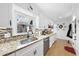 Kitchen boasts modern stainless appliances, granite countertops and breakfast bar with seating at 401 Fletcher Dr, Raleigh, NC 27603
