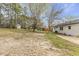 Large backyard with mature trees and room for outdoor entertaining at 409 Avery St, Garner, NC 27529