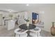 Open concept blends the dining area and kitchen, offering seamless transition and ample space for entertaining at 409 Avery St, Garner, NC 27529
