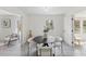 Charming dining area with a contemporary table, comfortable chairs, and natural light, perfect for meals at 409 Avery St, Garner, NC 27529