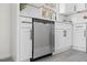 Kitchen with stainless steel dishwasher, white cabinetry and modern finishes for meal prep at 409 Avery St, Garner, NC 27529