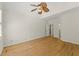 View of a bedroom with a ceiling fan and hardwood floors at 6008 Chittim Ct, Raleigh, NC 27616