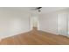Bedroom with hardwood floors, ceiling fan, and ensuite bathroom at 6008 Chittim Ct, Raleigh, NC 27616