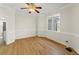 Bright dining room with hardwood floors, crown molding and a ceiling fan at 6008 Chittim Ct, Raleigh, NC 27616
