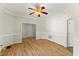 Bright dining room with hardwood floors, crown molding and a ceiling fan at 6008 Chittim Ct, Raleigh, NC 27616