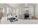 Bright, modern kitchen featuring a large island, stainless steel appliances, and plenty of natural light at 6008 Chittim Ct, Raleigh, NC 27616