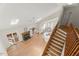 Bright, open living room featuring hardwood floors, fireplace, and an abundance of natural light at 6008 Chittim Ct, Raleigh, NC 27616